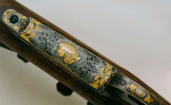 Extensive engraving with much inlay work.