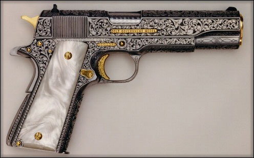 A pistol engraved by John Barraclough.