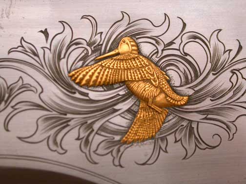 A woodcock inlaid in gold!